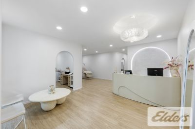 REFURBISHED RETAIL WITH HOLDING INCOME!