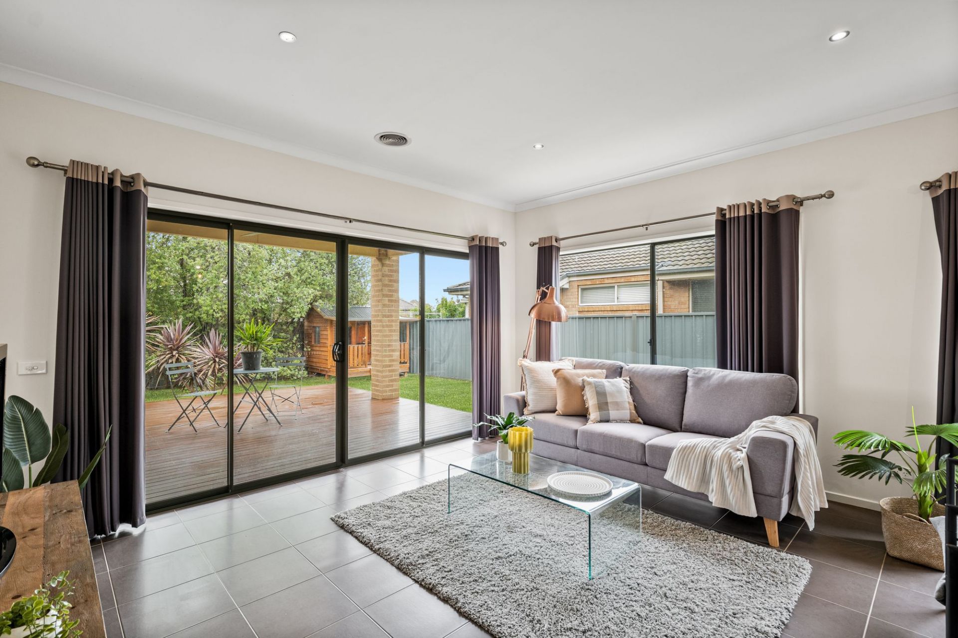 Modern Family Living with a Study, Large Deck, and Generous Backyard