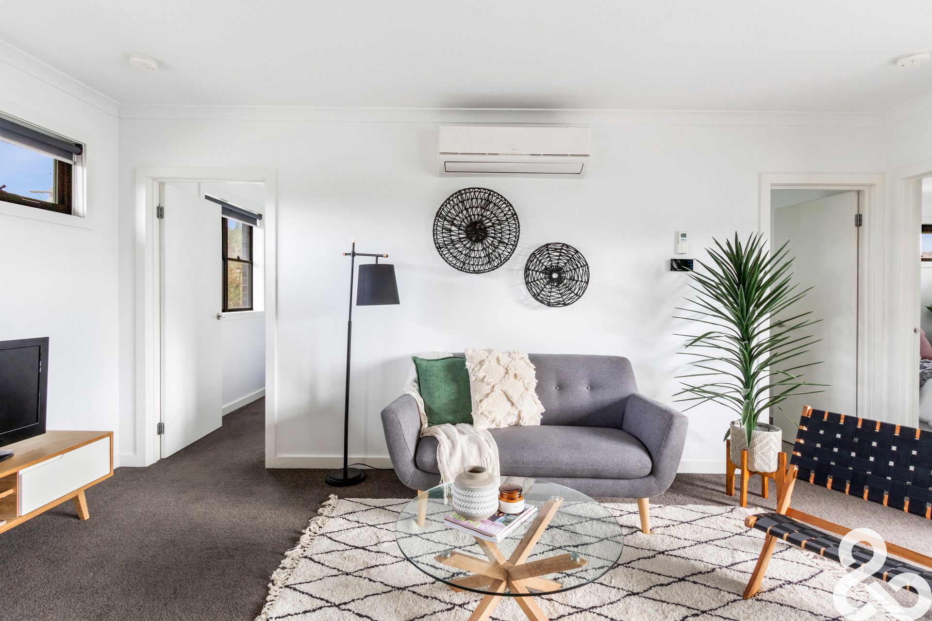 A MUST SEE! Designer Upper-Level Unit in Prime Location