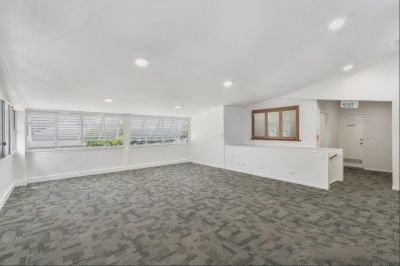 TURN KEY OFFICE WITH SUBSTANTIAL NATURAL LIGHT!