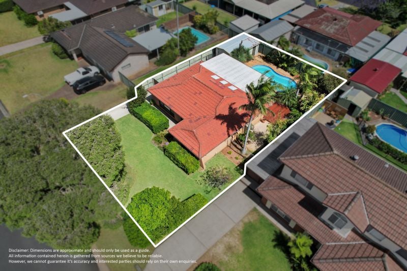 Charming Family Home with Beautiful Landscaped Grounds and Inviting Living Spaces