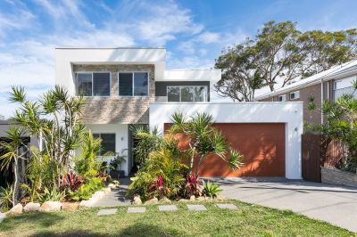 LUXURY LIVING IN CARINGBAH SOUTH WITH SERENE BAY VIEWS