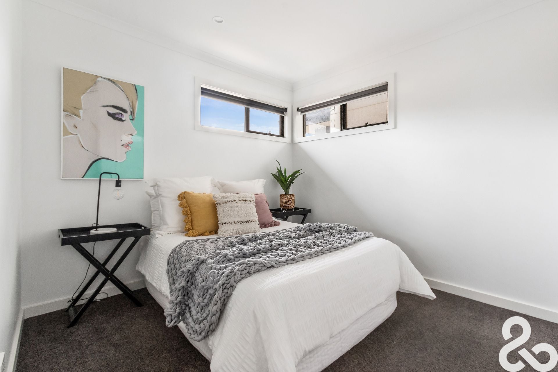A MUST SEE! Designer Upper-Level Unit in Prime Location
