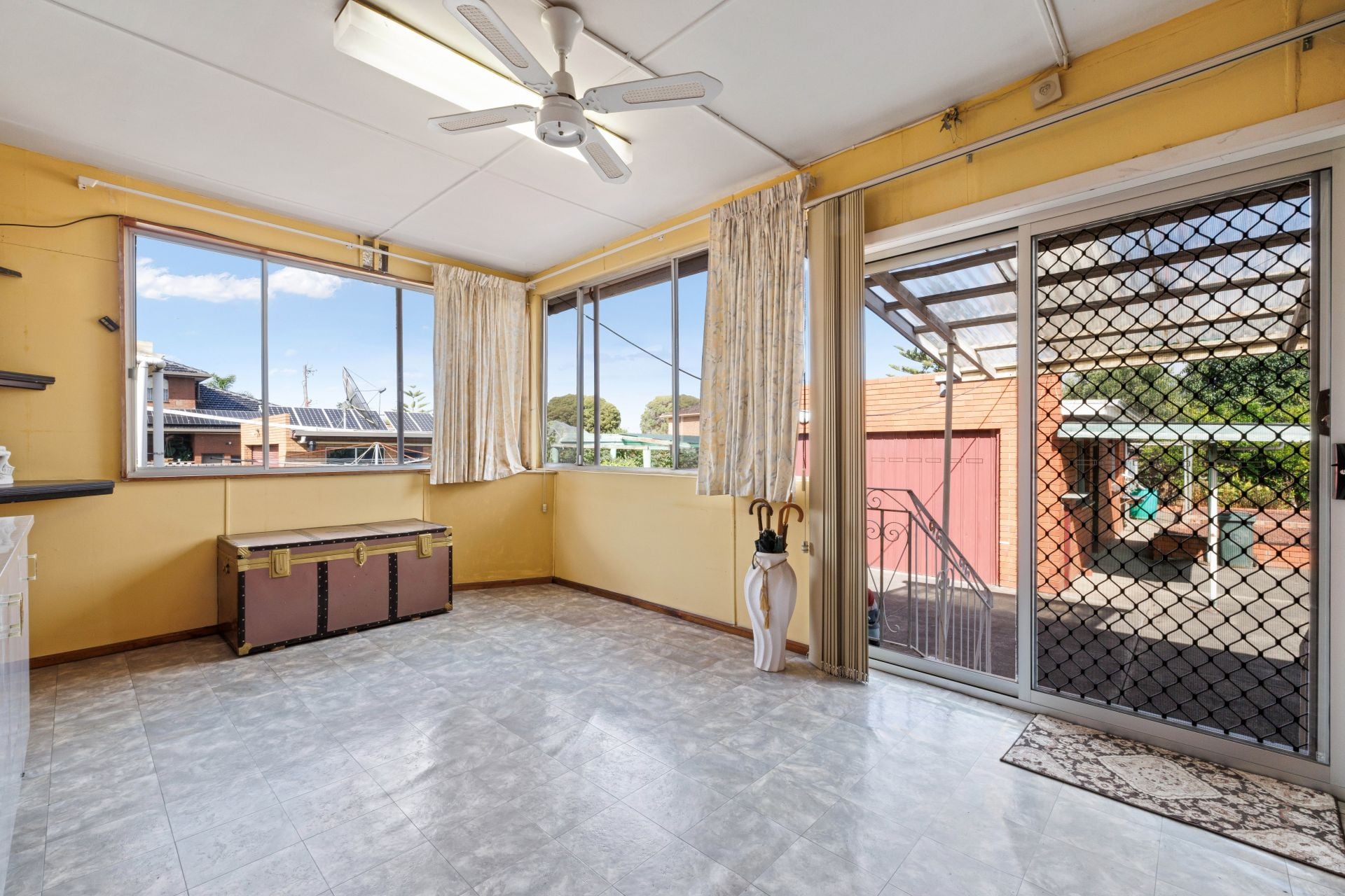 A Solid Family Home Brimming With 80's Charm