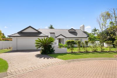 North-Facing Golf Course Haven in Exclusive Palm Meadows Estate.