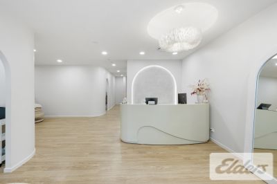 REFURBISHED RETAIL WITH HOLDING INCOME!