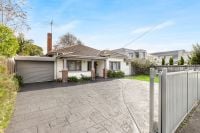 Warm Family Living in Prized BHS Zone