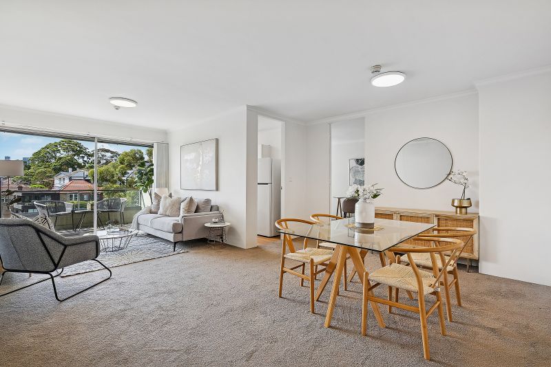 Sunlit top-floor living with views over Berry's Bay & North Sydney skyline