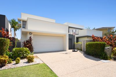 Immaculate Lakefront Home in Exclusive Gated Hope Island Community