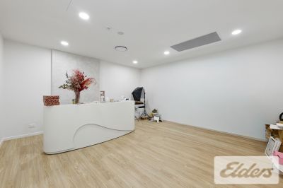 REFURBISHED RETAIL WITH HOLDING INCOME!