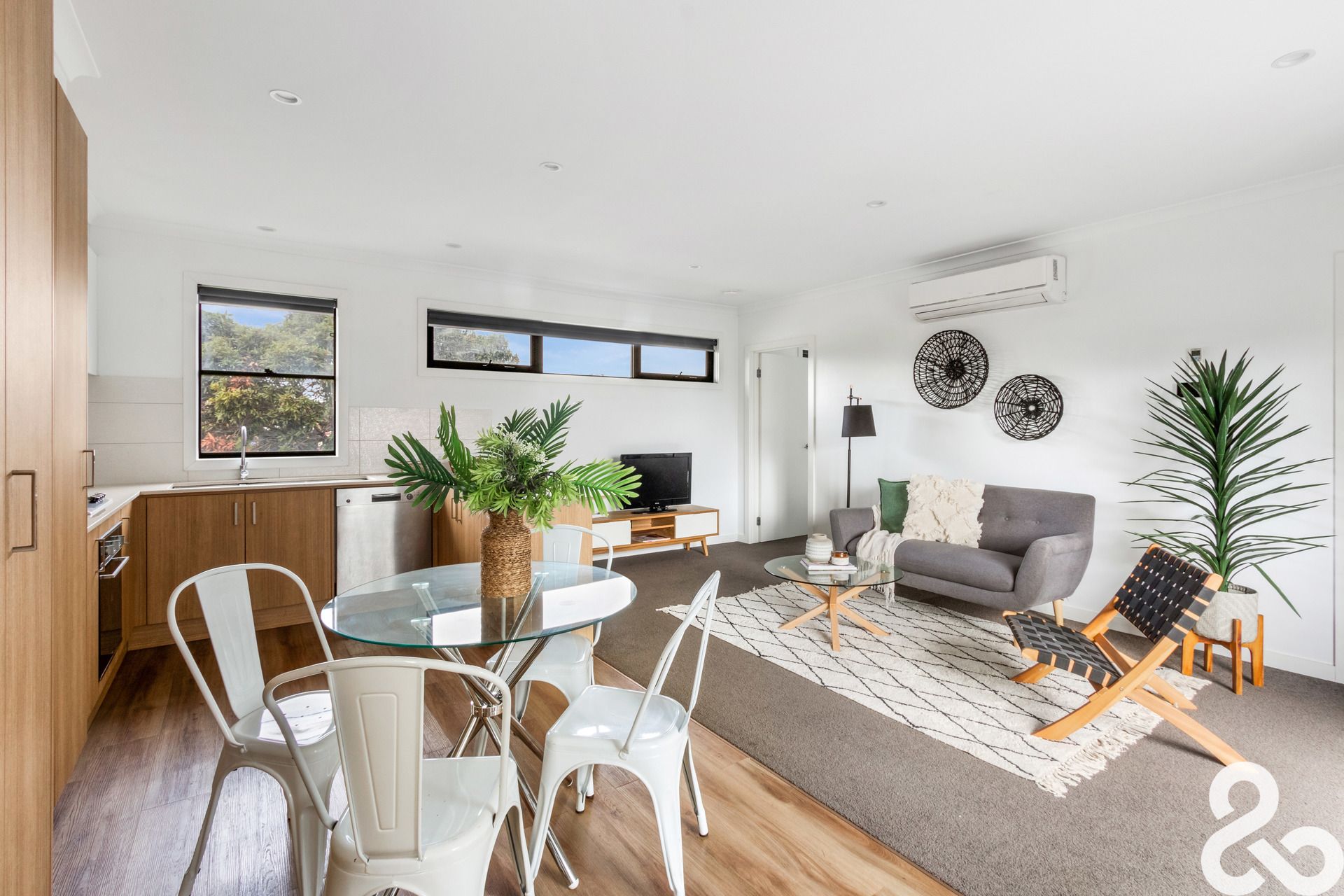 A MUST SEE! Designer Upper-Level Unit in Prime Location