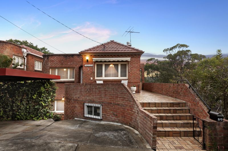 Entire duplex in a premier location with huge potential