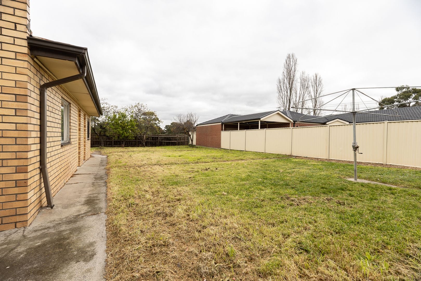 Well-Maintained Three-Bedroom Home with Large Backyard