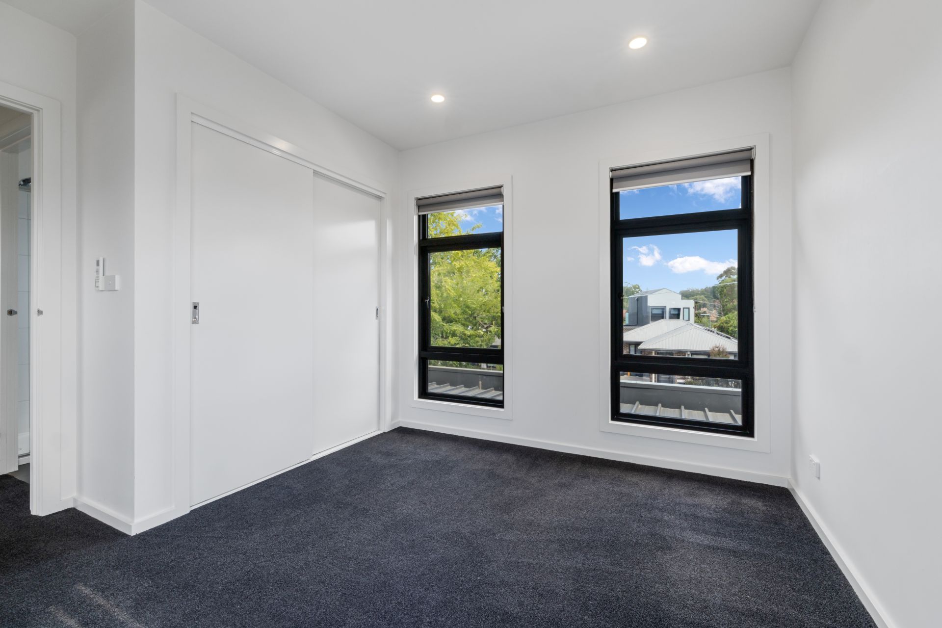 Stylish Modern Living with Private Courtyard & Balcony in Prime Reservoir Location