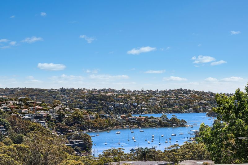 Elegant north-facing residence with water views and level access