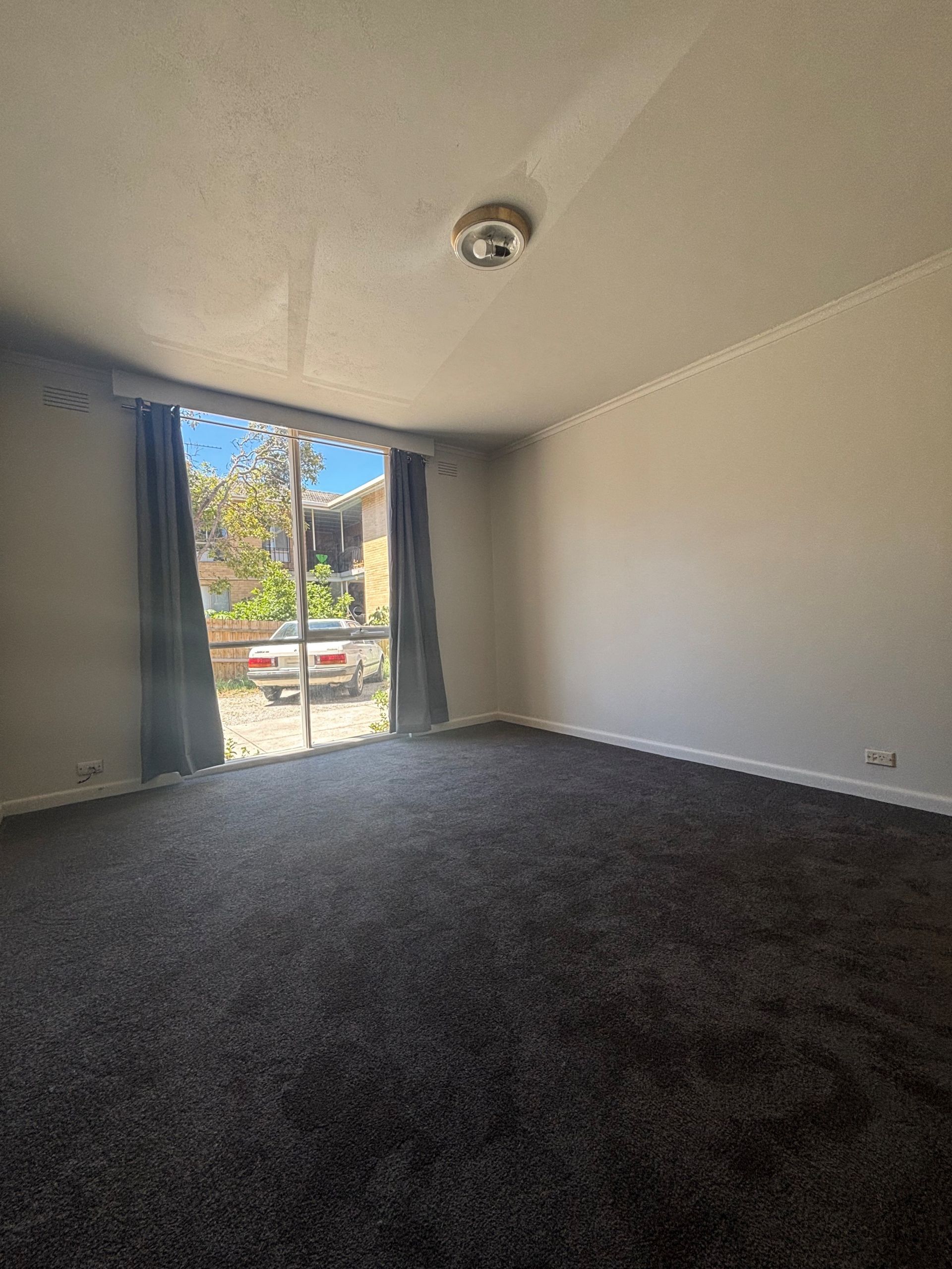 Freshly Painted Two-Bedroom Unit with New Carpet