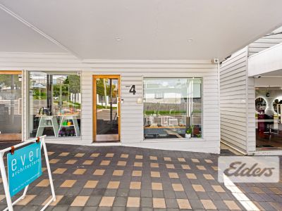 HIGHLY EXPOSED RETAIL/OFFICE IN SHARP SUBURBAN COMPLEX!