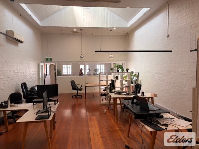 CHARACTER 1ST FLOOR OFFICE IN ANTIQUE PRECINCT!