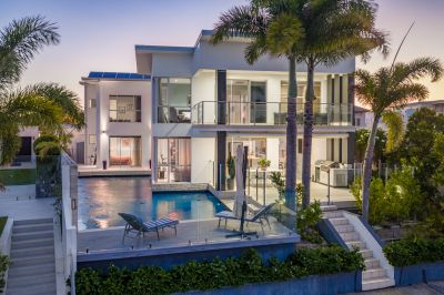 North-Facing Waterfront Elegance with a Showstopping Pool