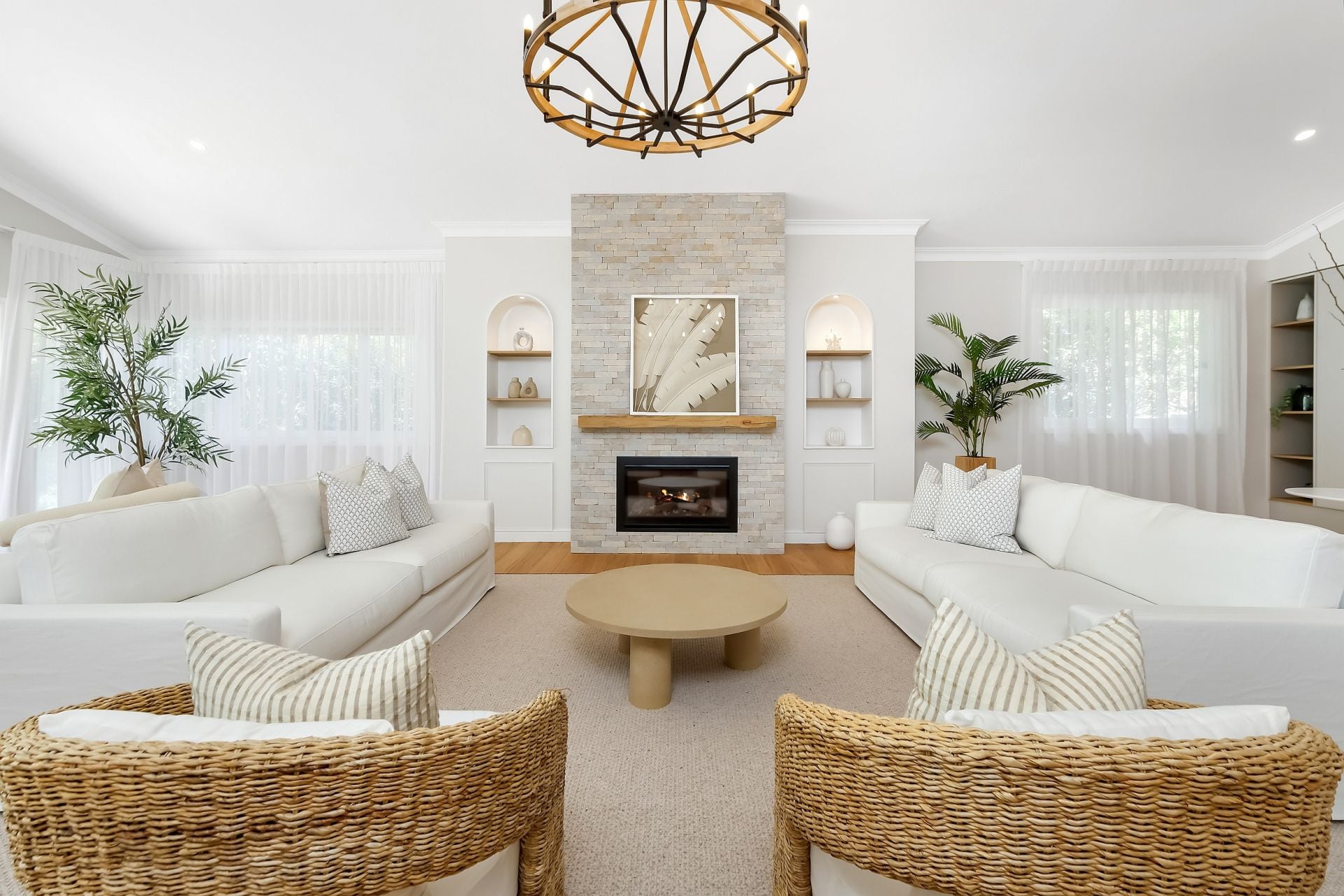 Melody Park — living room, stone fireplace, Novari Collective interior design