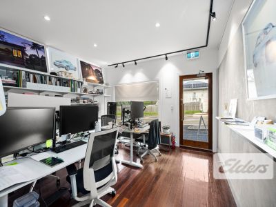 HIGHLY EXPOSED RETAIL/OFFICE IN SHARP SUBURBAN COMPLEX!