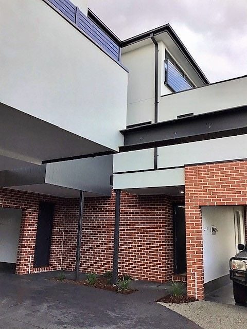 Architecturally Designed, Tri-Level Townhouse