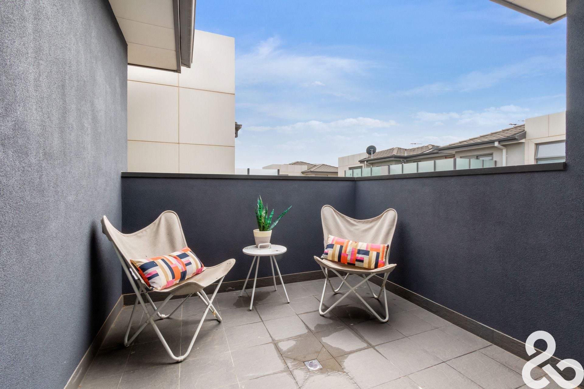 A MUST SEE! Designer Upper-Level Unit in Prime Location