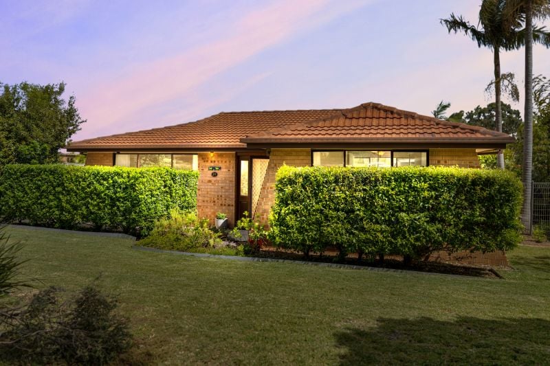 Charming Family Home with Beautiful Landscaped Grounds and Inviting Living Spaces