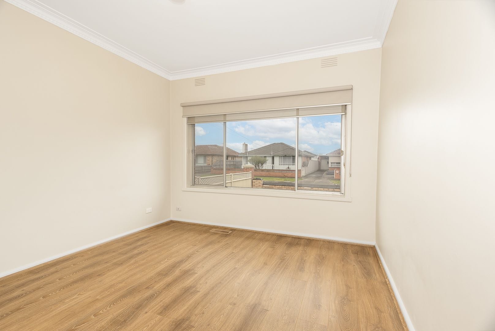 Well-Maintained Three-Bedroom Home with Large Backyard
