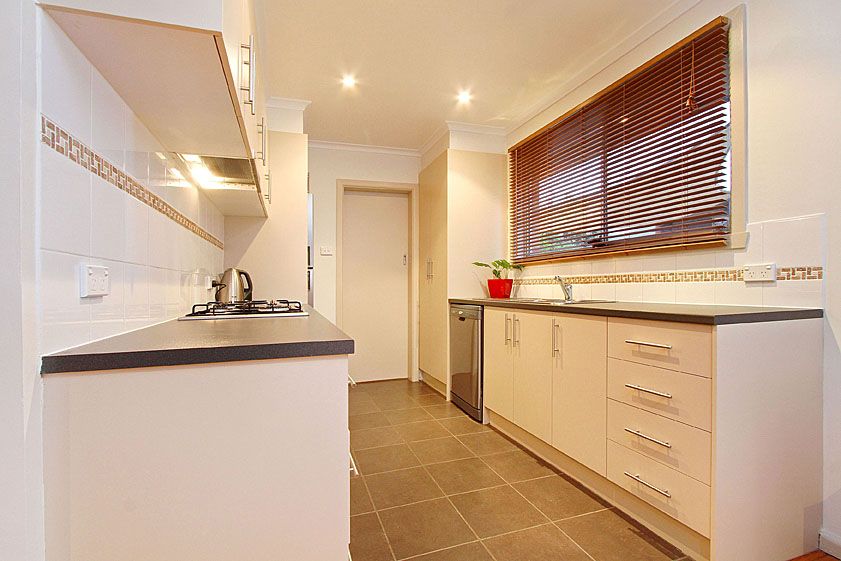 STYLISHLY HOME, CLOSE TO ALL AMENITIES