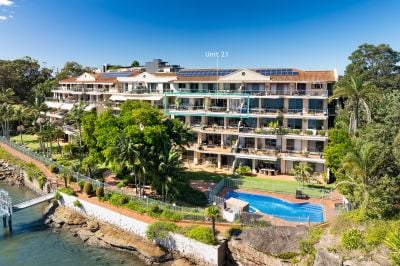 ELEVATED WATERFRONT LIVING WITH PRIVATE MARINA BERTH