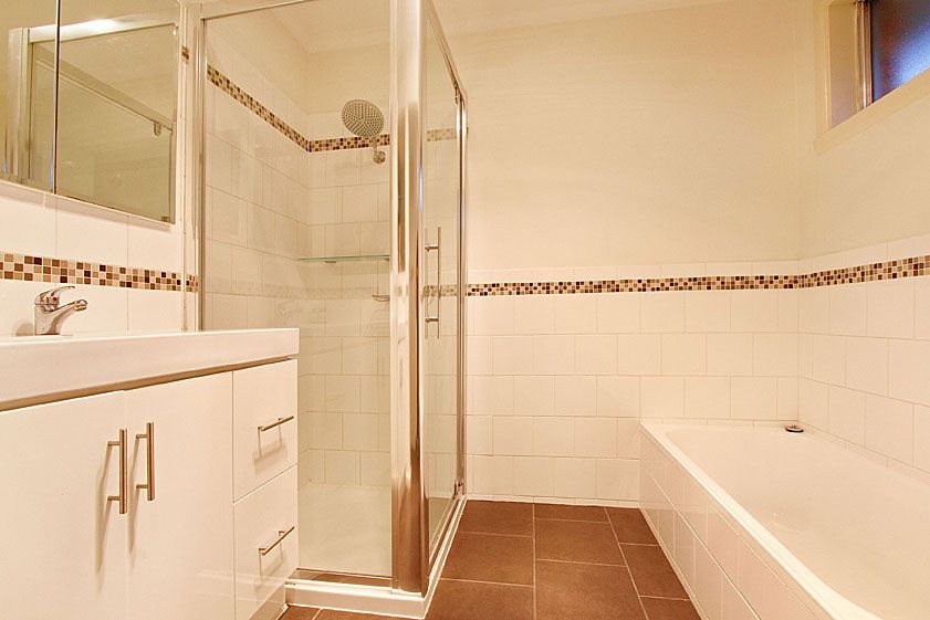STYLISHLY HOME, CLOSE TO ALL AMENITIES