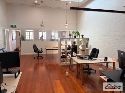 CHARACTER 1ST FLOOR OFFICE IN ANTIQUE PRECINCT!