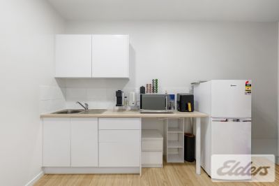 REFURBISHED RETAIL WITH HOLDING INCOME!