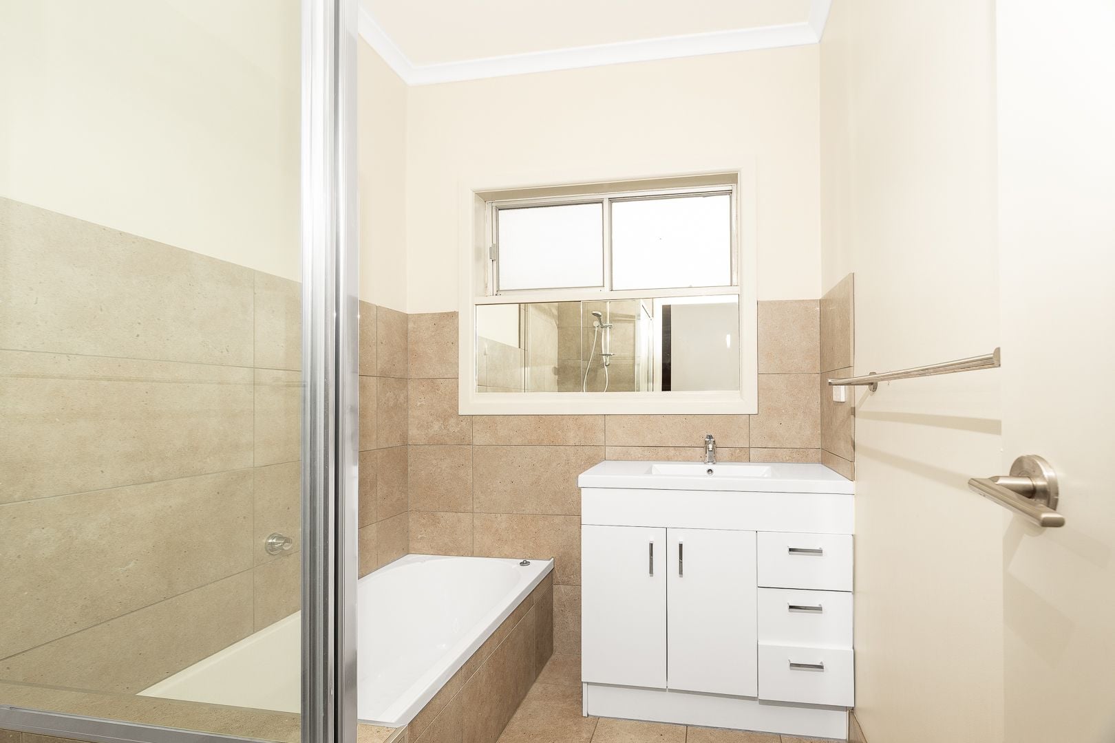 Well-Maintained Three-Bedroom Home with Large Backyard