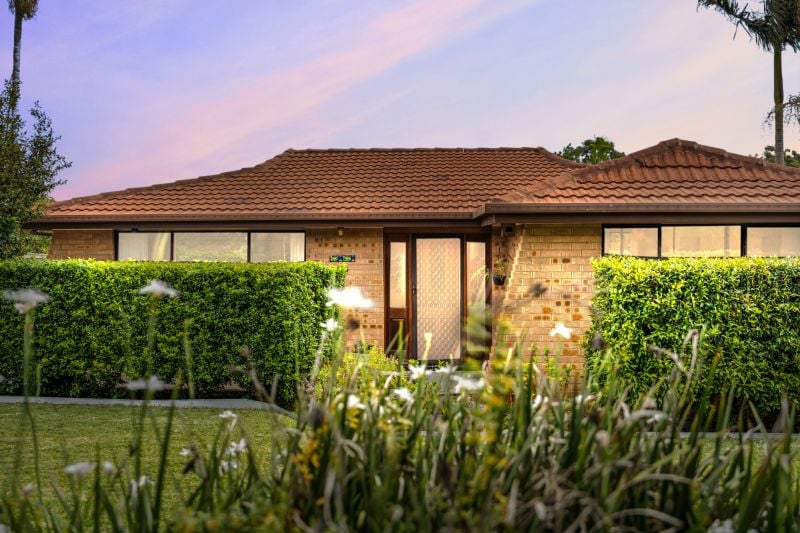 Charming Family Home with Beautiful Landscaped Grounds and Inviting Living Spaces