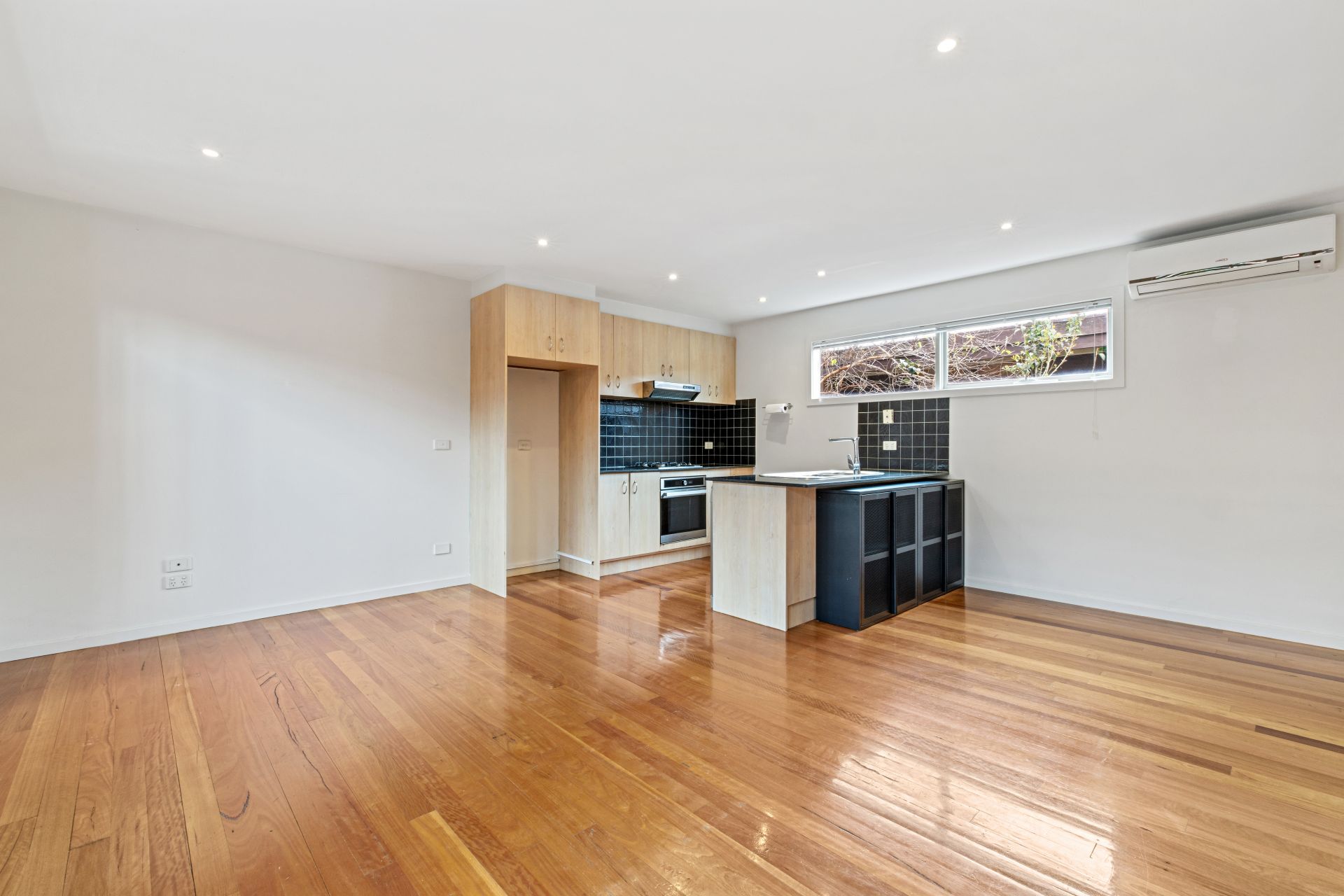 Stylish three bedroom townhouse is ideally located