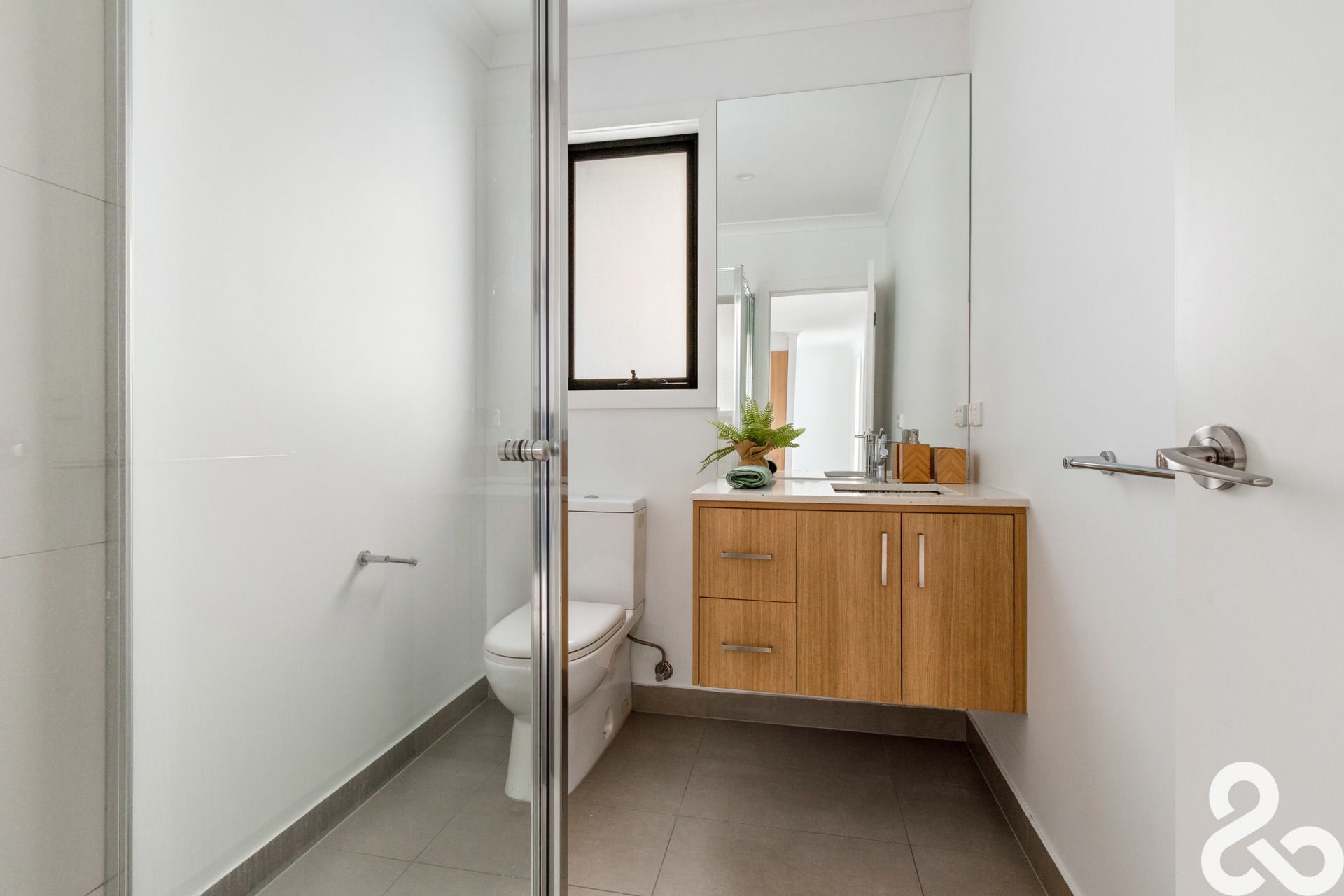 A MUST SEE! Designer Upper-Level Unit in Prime Location