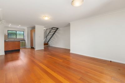 SPLIT-LEVEL TWO BEDROOM TOWNHOUSE IN TIGHTLY HELD COMPLEX