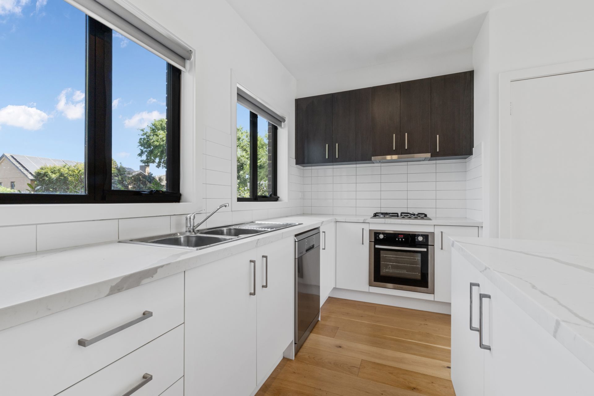 Stylish Modern Living with Private Courtyard & Balcony in Prime Reservoir Location