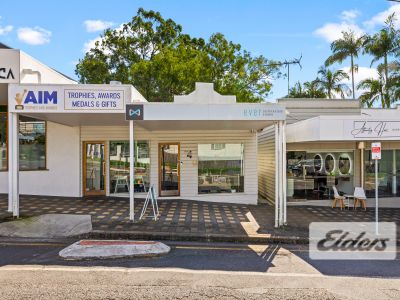 HIGHLY EXPOSED RETAIL/OFFICE IN SHARP SUBURBAN COMPLEX!