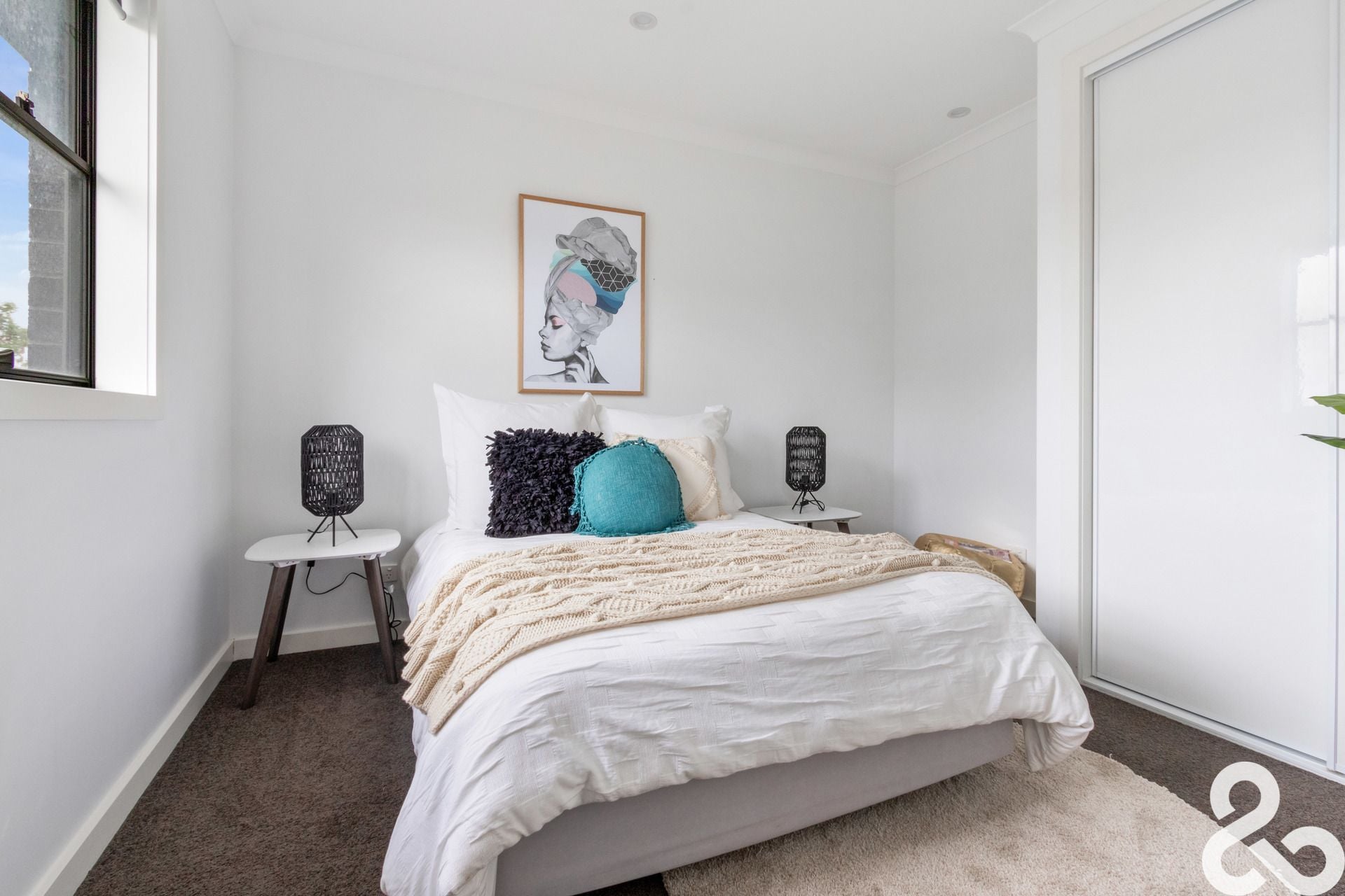 A MUST SEE! Designer Upper-Level Unit in Prime Location