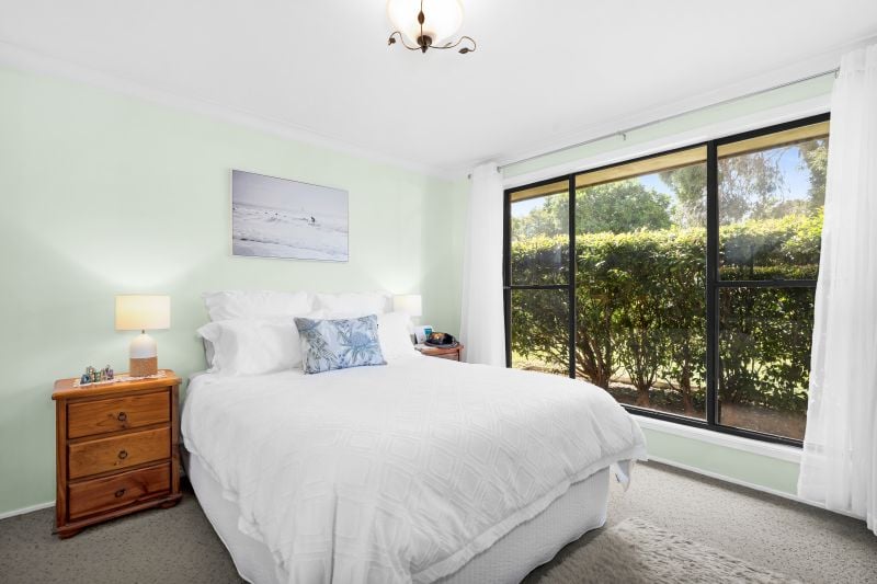 Charming Family Home with Beautiful Landscaped Grounds and Inviting Living Spaces