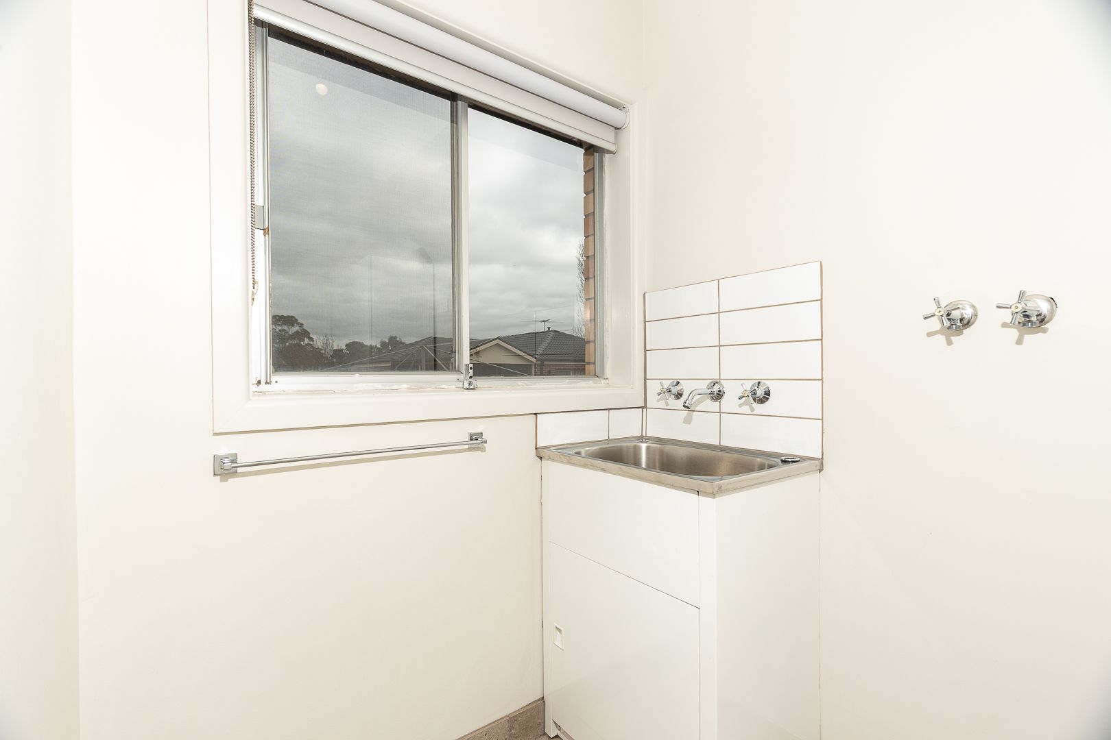 Well-Maintained Three-Bedroom Home with Large Backyard