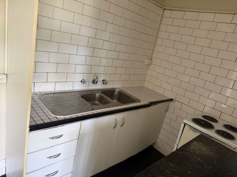 Light-Filled 1-Bedroom Apartment with Ensuite and Parking in Prime Location
