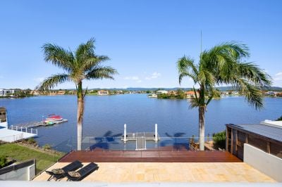 Palatial Masterpiece with Stunning Waterfront & Mountain Views