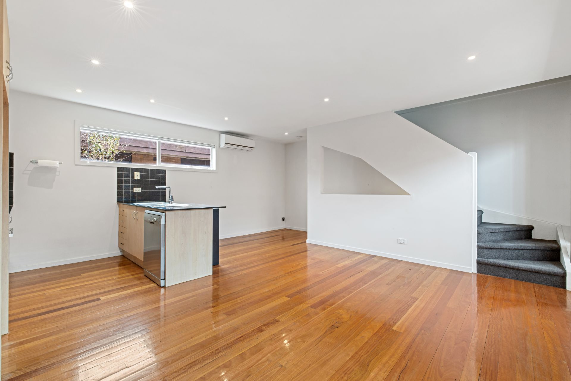 Stylish three bedroom townhouse is ideally located