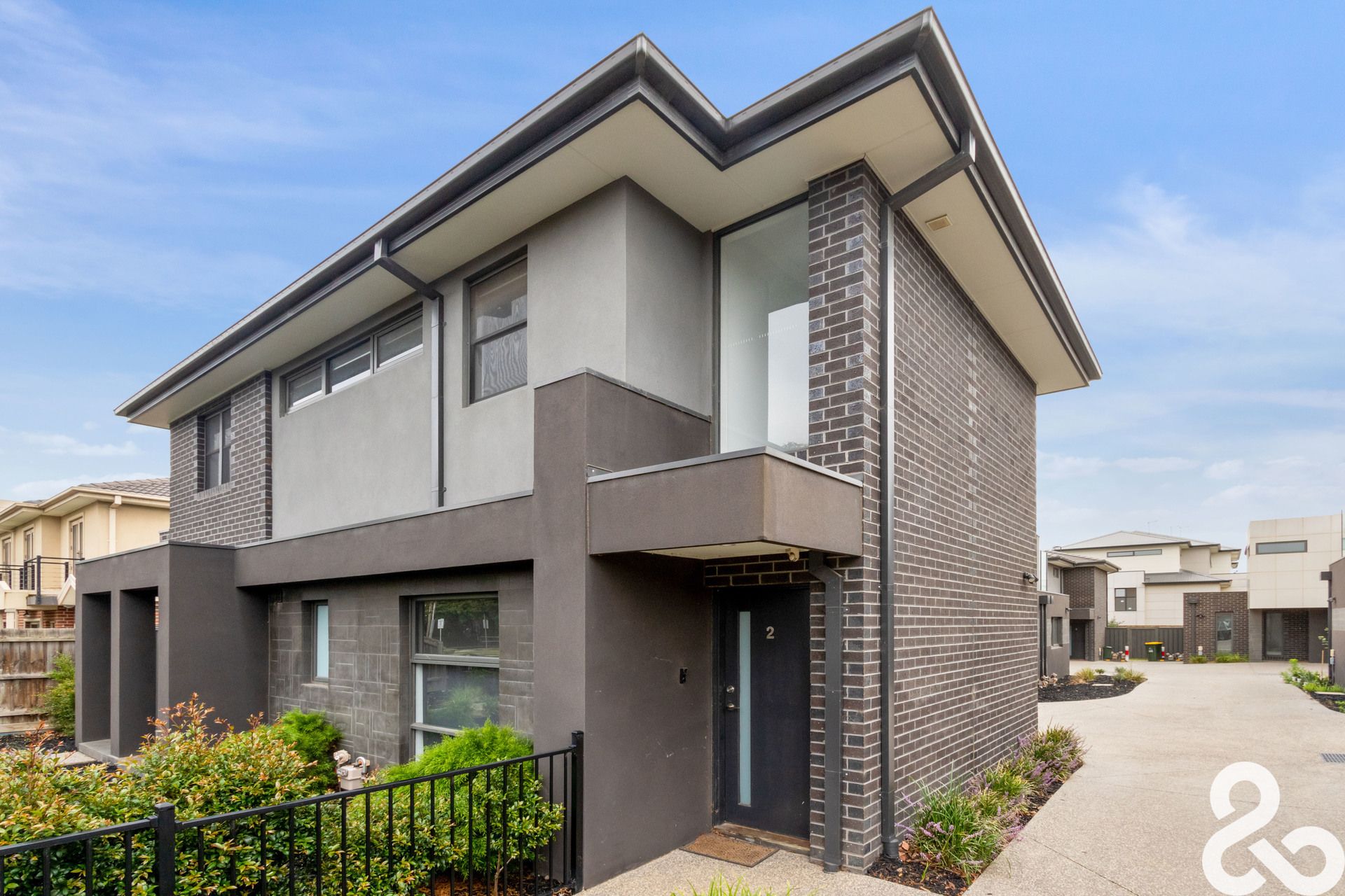 A MUST SEE! Designer Upper-Level Unit in Prime Location