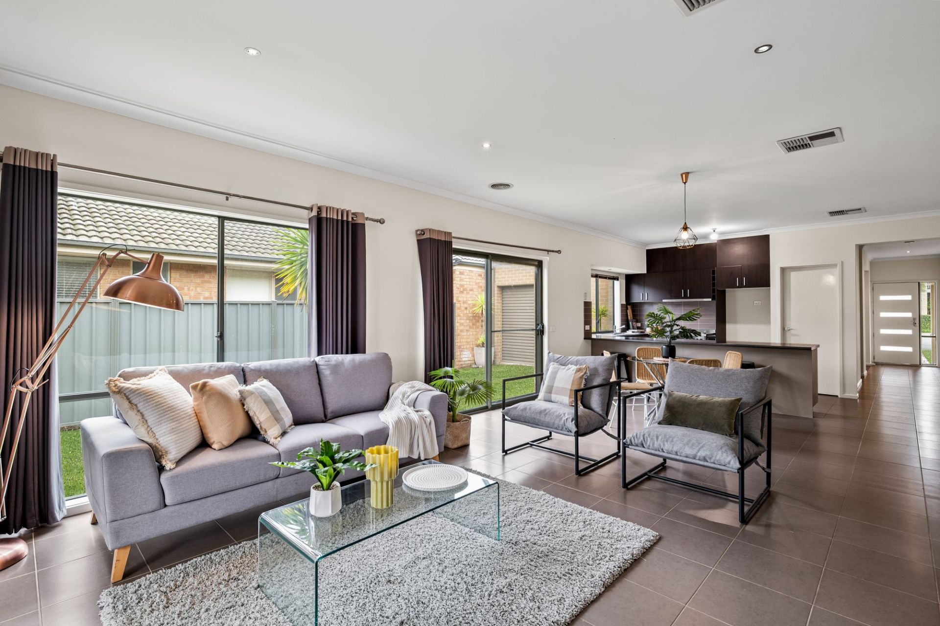 Modern Family Living with a Study, Large Deck, and Generous Backyard