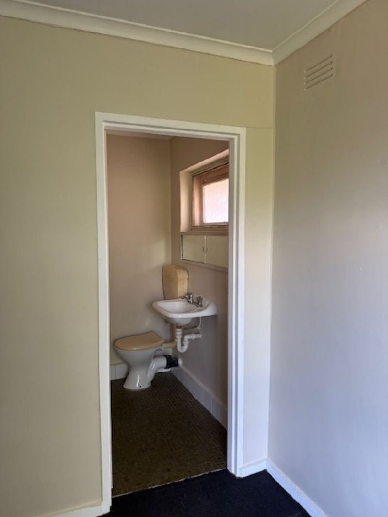 Light-Filled 1-Bedroom Apartment with Ensuite and Parking in Prime Location